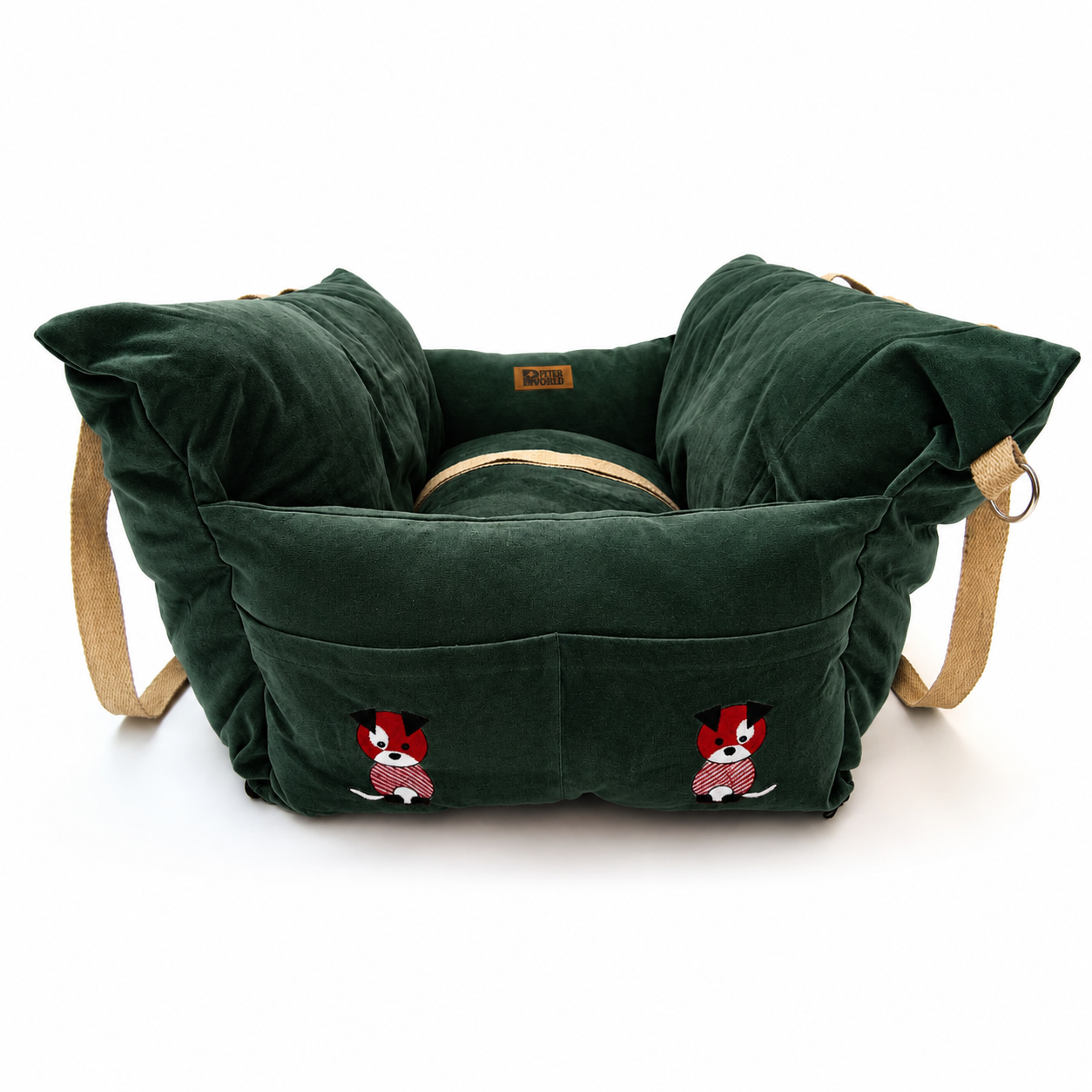 A plush olive green pet bed with tan straps, featuring embroidered cartoon dog characters on the front and a small brown brand label near the top.